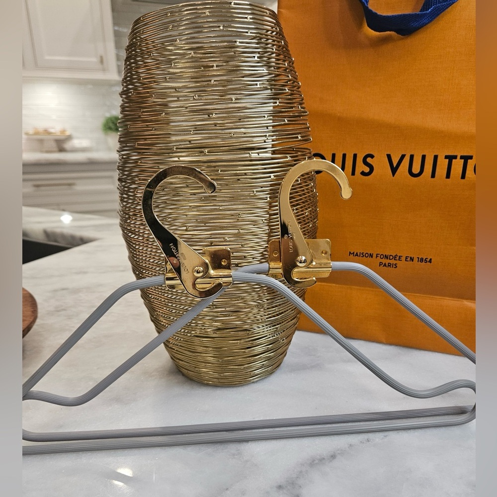 Two Louis Vuitton Hangers